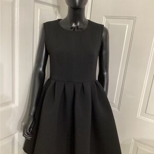 Black “Gracia” babydoll dress, fabric neoprene, size Large.